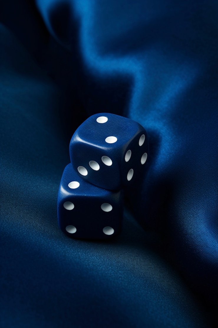 Live-dealer Baccarat studio with croupier, cards, and multi-camera feed on ligazoom login